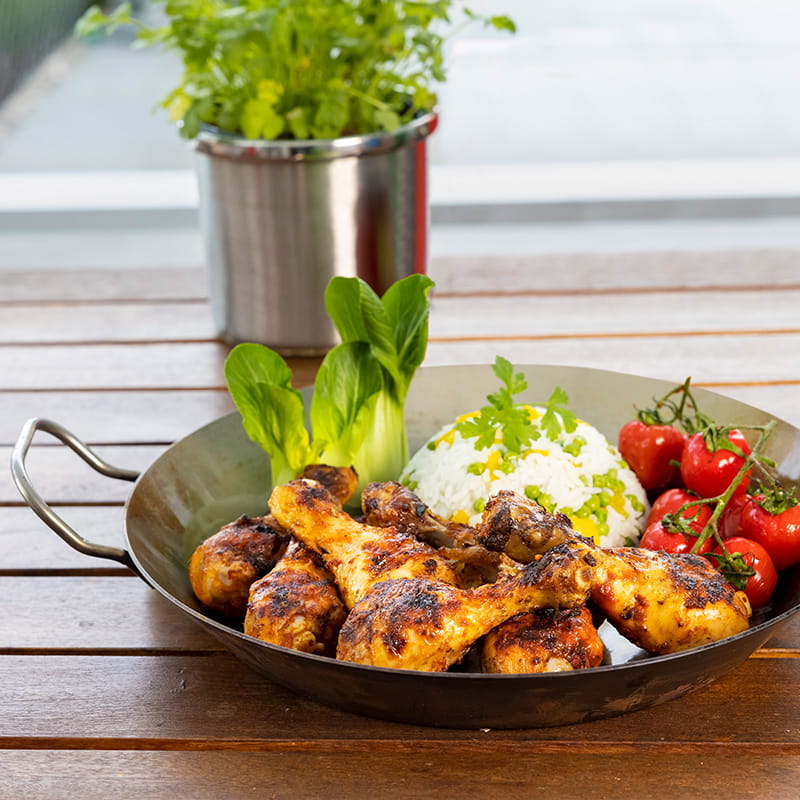 Pouletschenkel mit Currypaste und Kokosnussmilch mariniert