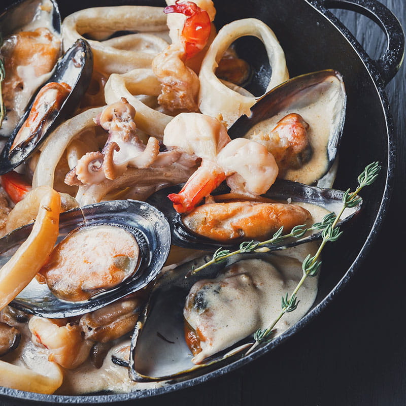 Muscheln mit Zitronengras und Kokosnussmilch